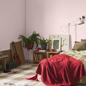 Pink bedroom with plants