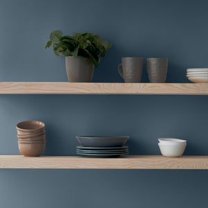 Muted blue painted wall
