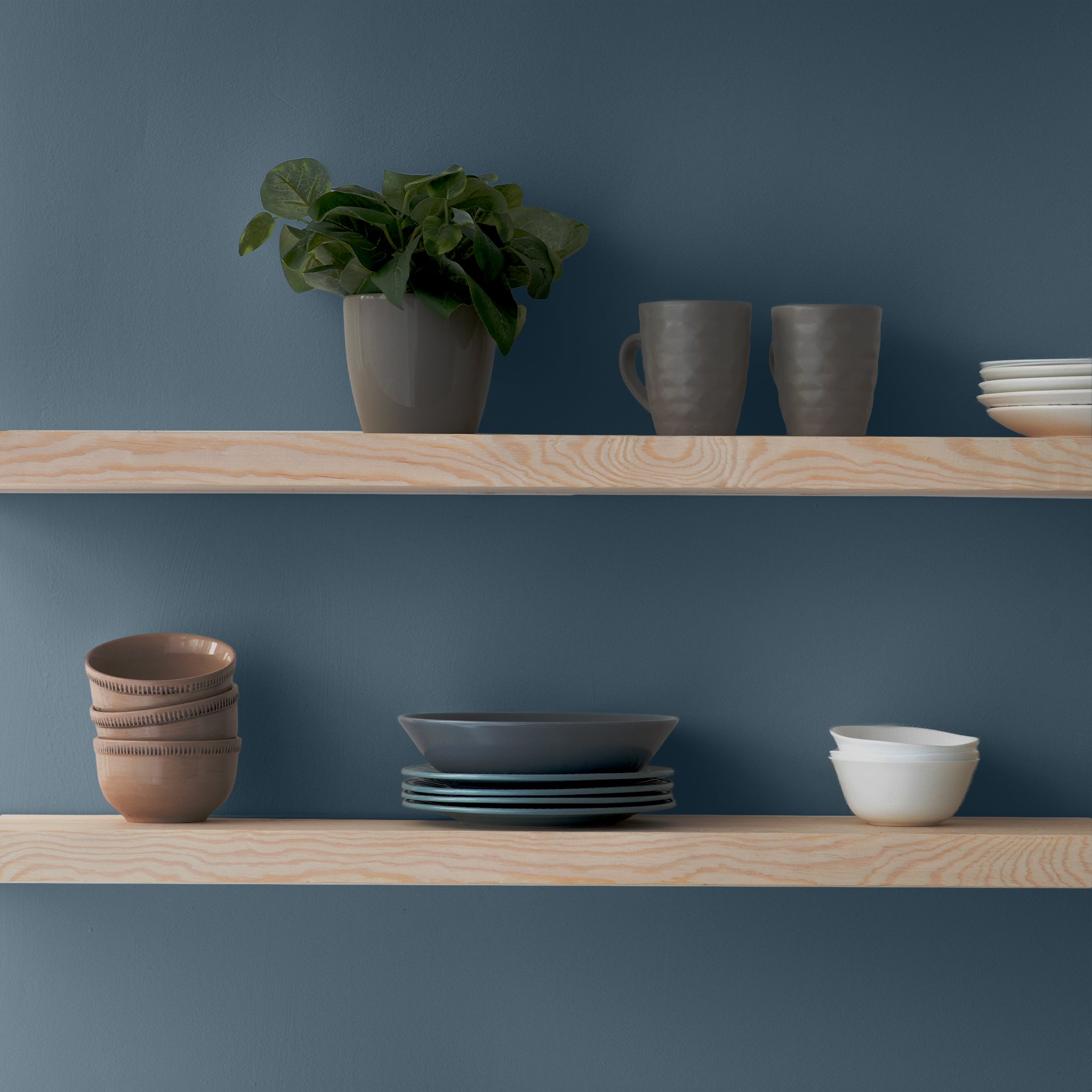 Wooden shelves with ceramics
