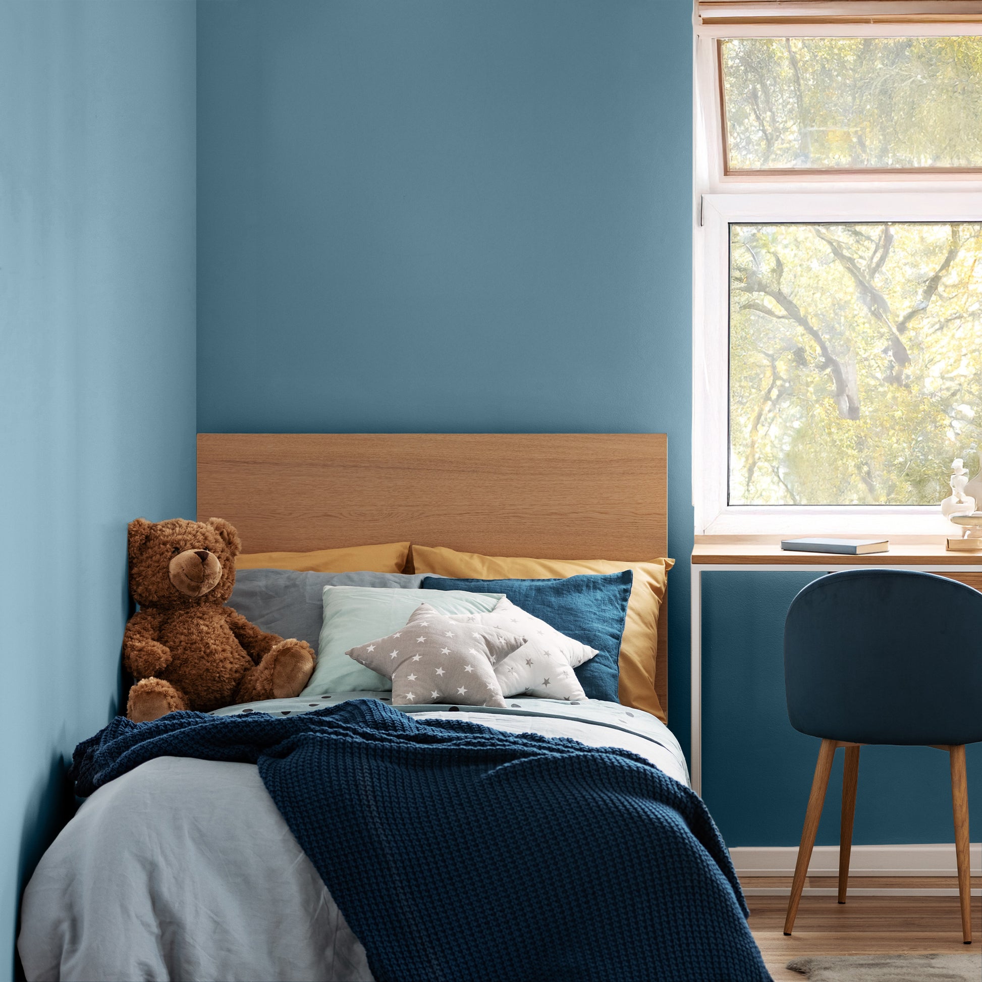 Muted blue bedroom wall